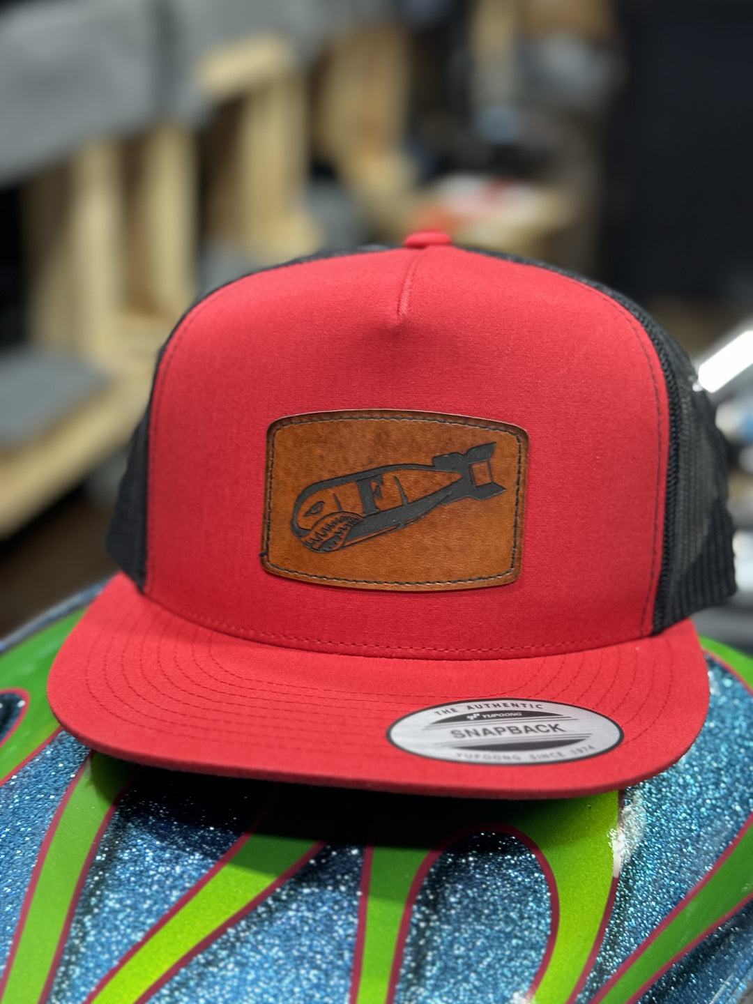 LEATHER PATCH RED/BLACK SNAP BACK TRUCKER HAT